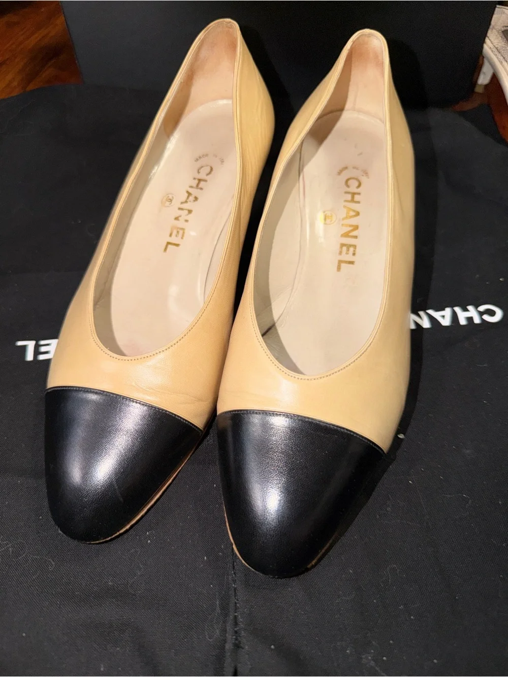 CHANEL Beige Leather Flats with Black Cap Toe